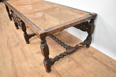 Lot 1229 - 1920s Jacobean revival oak framed stool with canework top