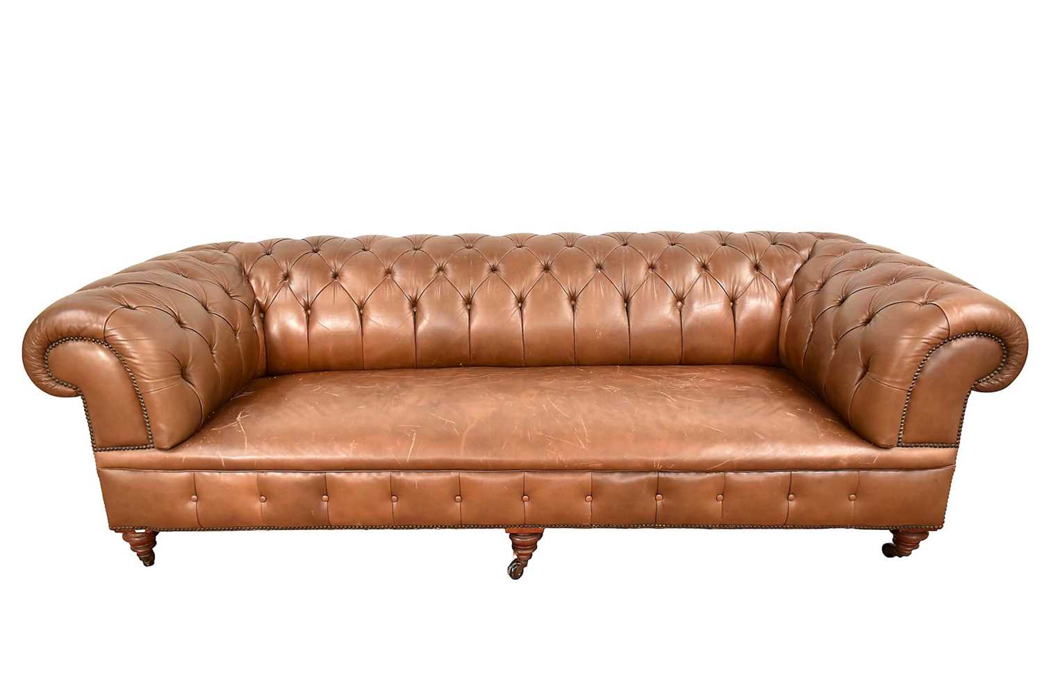 Lot 1228 - Large Victorian chesterfield with buttoned brown leather upholstery
