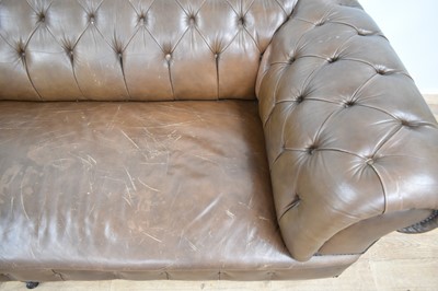 Lot 1228 - Large Victorian chesterfield with buttoned brown leather upholstery