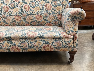 Lot 1227 - Edwardian sofa, arched back above scroll arms