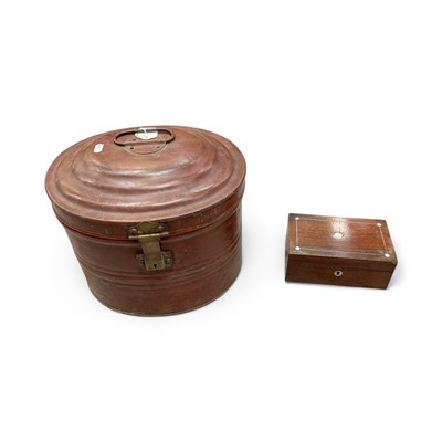 Lot 61 - Antique tin hat box and a small rosewood sewing box with mother of pearl inlay (2)