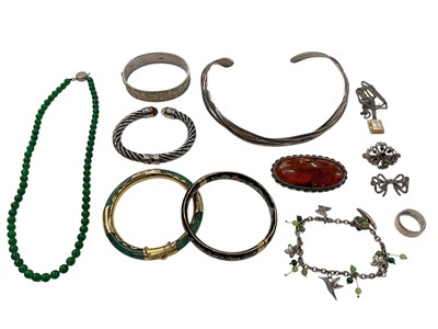 Lot 975 - Contemporary silver twisted three stand torque necklace, silver torque bangle with faceted gemstone terminals, silver bangle with engraved scroll decoration (Birmingham 1977), two other bangles,...
