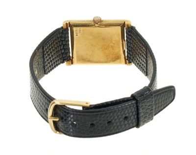 Lot 771 - Piaget 18ct gold tank wristwatch on leather strap