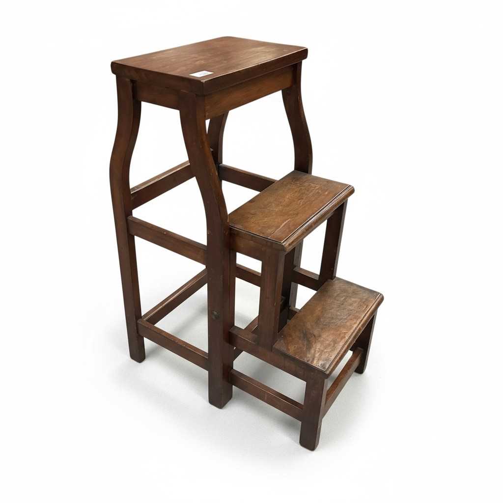 Lot 1209 - Folding mahogany library steps with leather covered treads