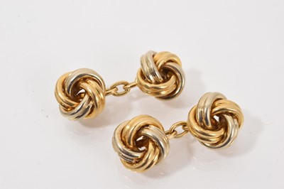 Lot 721 - Pair of Italian three colour gold knot cufflinks, stamped 750