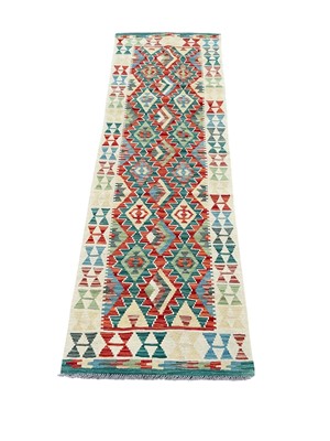 Lot 1495 - Chobi Kilim runner with geometric decoration on cream and multicoloured ground, 200cm x 63cm