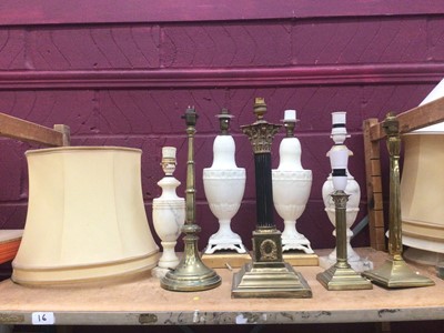 Lot 749 - Group of antique lamps to include brass, porcelain and marble lamps (wires cut)