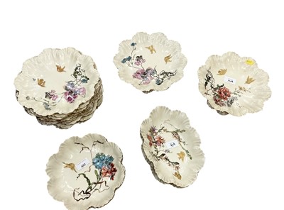 Lot 402 - Early 20th century Limoges blush porcelain dessert service with floral decoration.