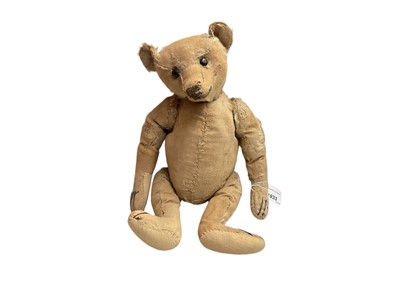 Lot 1933 - Steiff bear, much loved, possible evidence of lost Steiff button on ear, boot button eyes, elongated snout, long limbs, four stitched claws