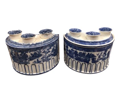 Lot 754 - Two early 19th century English pearl ware Bough pots with blue and white printed Chinese landscape decoration