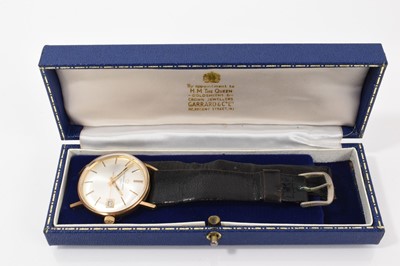 Lot 773 - Eterna-matic 9ct gold wristwatch, the silvered dial with applied baton markers and date aperture at 3 o'clock in a 9ct gold case, on a black leather strap in original Garrard box