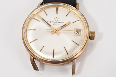 Lot 773 - Eterna-matic 9ct gold wristwatch, the silvered dial with applied baton markers and date aperture at 3 o'clock in a 9ct gold case, on a black leather strap in original Garrard box