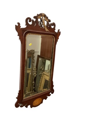 Lot 1544 - Antique mahogany and parcel gilt wall mirror with bevelled plate, 91.5cm x 50.5cm