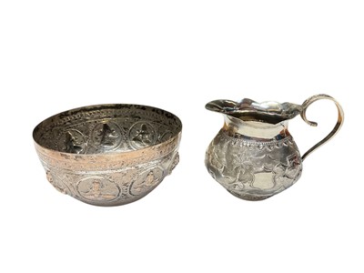 Lot 159 - Eastern white metal bowl and milk jug, possibly Indian, jug 8.5cm in overall height, all at approximately 6ozs (2)