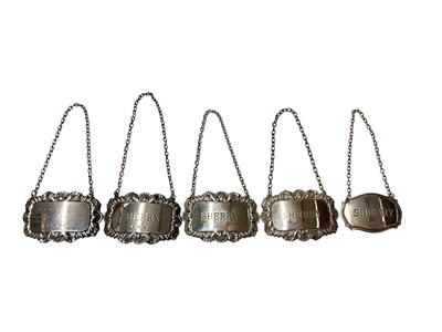Lot 162 - Four contemporary decanter labels engraved Sherry, together with another with an engraved presentation inscription, (various dates and makers), all at 2ozs.