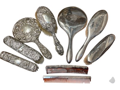 Lot 164 - Two silver backed hand mirrors, together with various silver mounted bushes and combs, (various dates and makers) (1 box).