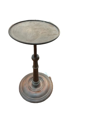 Lot 428 - Mahogany adjustable candle stand, 33.5cm in height (at tallest position).