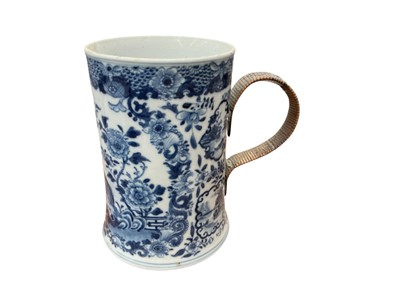 Lot 431 - 18th century Chinese porcelain mug with later wicker covered iron handle, 14.5cm in height.