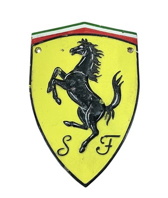 Lot 439 - Contemporary cast metal Ferrari wall plaque / sign, 29.5cm in overall length.