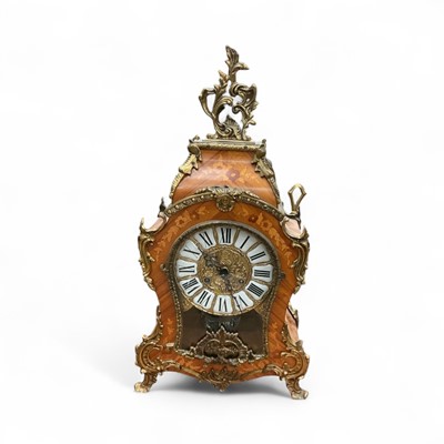 Lot 450 - Impressive reproduction Italian mantel clock with gilt metal mounts, in an inlaid wood case, 60cm in overall height.