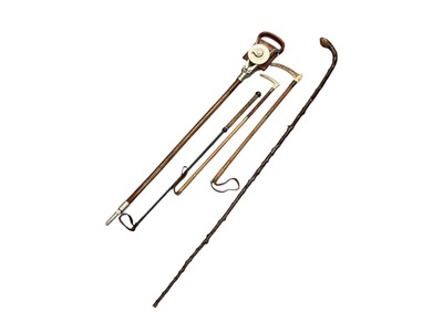 Lot 456 - Vintage leather shooting stick and riding crops.