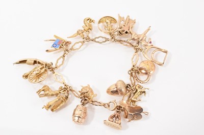 Lot 677 - 9ct gold charm bracelet