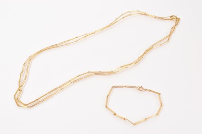 Lot 654 - Yellow metal long link guard chain and matching bracelet
