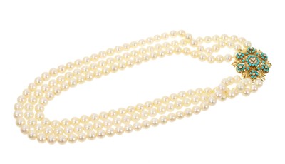 Lot 655 - 1960s cultured pearl three strand necklace with an 18ct gold turquoise and diamond flower head cluster clasp (London 1963)