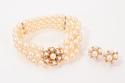 Lot 656 - Cultured pearl three strand bracelet with 9ct gold and cultured pearl clasp, together with a pair of 9ct gold cultured pearl flower head earrings