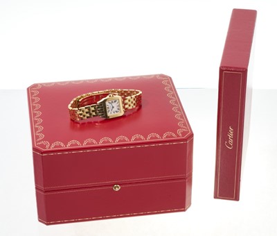 Lot 750 - Ladies' Cartier 'Santos Demoiselle' 18ct gold quartz wristwatch. Boxed with booklets, dated 2006.