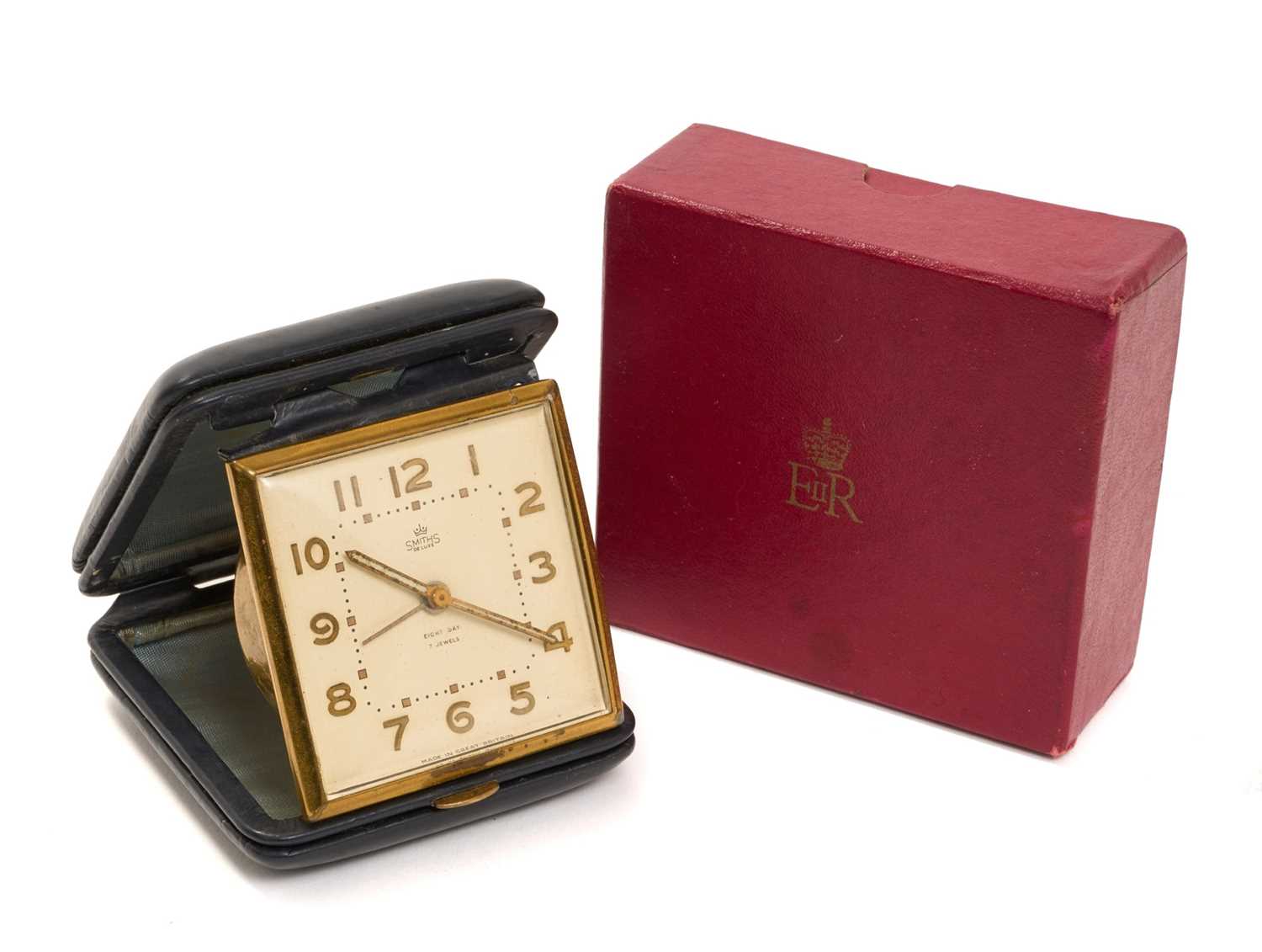 Lot 14 - H.M. Queen Elizabeth II, 1960s presentation Smiths alarm clock in leather case with gilt crowned ERII cypher to cover