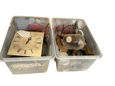 Lot 489 - Four boxes of assorted clock parts including dials, cases and movements, (4 boxes).