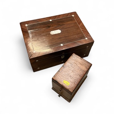 Lot 478 - 19th century Rosewood sewing box with mother of pearl inlaid decoration and fitted interior, together with a cigarette dispenser, (2).