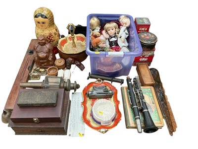 Lot 486 - Russian doll, other dolls, vintage tins, clarinet and sundries.