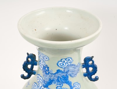 Lot 33 - Chinese celadon vase with dragon decoration