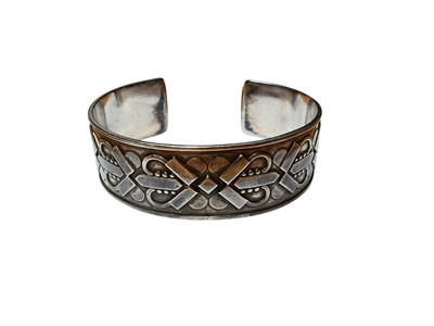 Lot 23 - Georg Jensen Danish silver cuff bangle designed by Harald Nielsen, with stylised Celtic design, no. 78