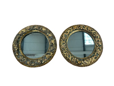 Lot 1205 - Pair of antique carved giltwood circular mirrors