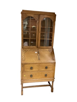 Lot 1559 - Oak bureau bookcase