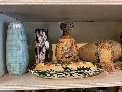 Lot 248 - Collection of pottery to include Bernard Rooke owl and wall pocket, two Beswick vases and others. (1 shelf)