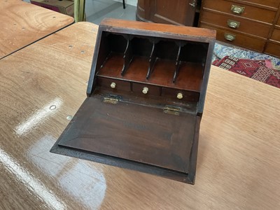 Lot 1202 - Georgian style walnut miniature bureau