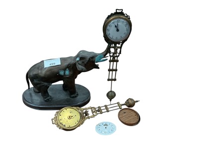Lot 499 - Spelter elephant clock.