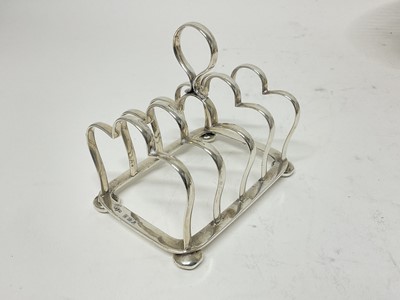 Lot 218 - Silver four division toast rack