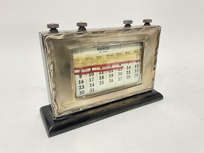 Lot 222 - Silver mounted wooden desk calendar