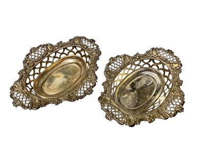Lot 151 - Pair of Victorian silver bon bon dishes with pierced scroll decoration, (Sheffield 1899), maker William Hutton and Sons Ltd, all at 4.5ozs, (2).