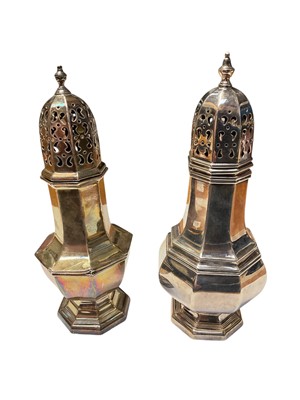 Lot 152 - George V silver sugar caster of octagonal form, with pierced slip in cover, (Birmingham 1913), together with another similar, (Birmingham 1966), all at approximately 9ozs, (2).