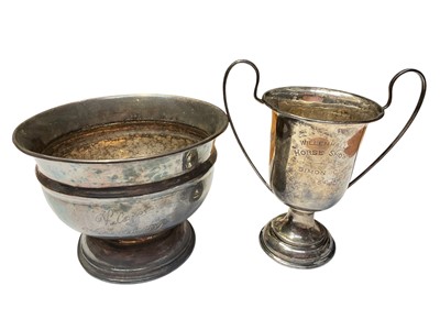 Lot 153 - George V silver two handled trophy cup with engraved presentation inscription, (Birmingham 1933), together with a silver pedestal bowl, (marks rubbed), all at approximately 7.5ozs, (2).