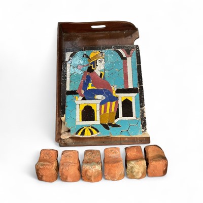 Lot 786 - Six terracotta pot feet together with a Persian tile panel