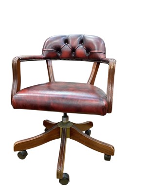 Lot 1567 - Leather revolving desk chair