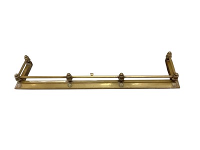 Lot 1574 - Victorian brass fender
