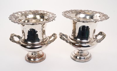 Lot 490 - Pair of 19th century silver plate twin handled wine coolers of campagna form, with grape and vine decoration, on pedestal bases, liners lacking, each 25.5cm overall height, (2).